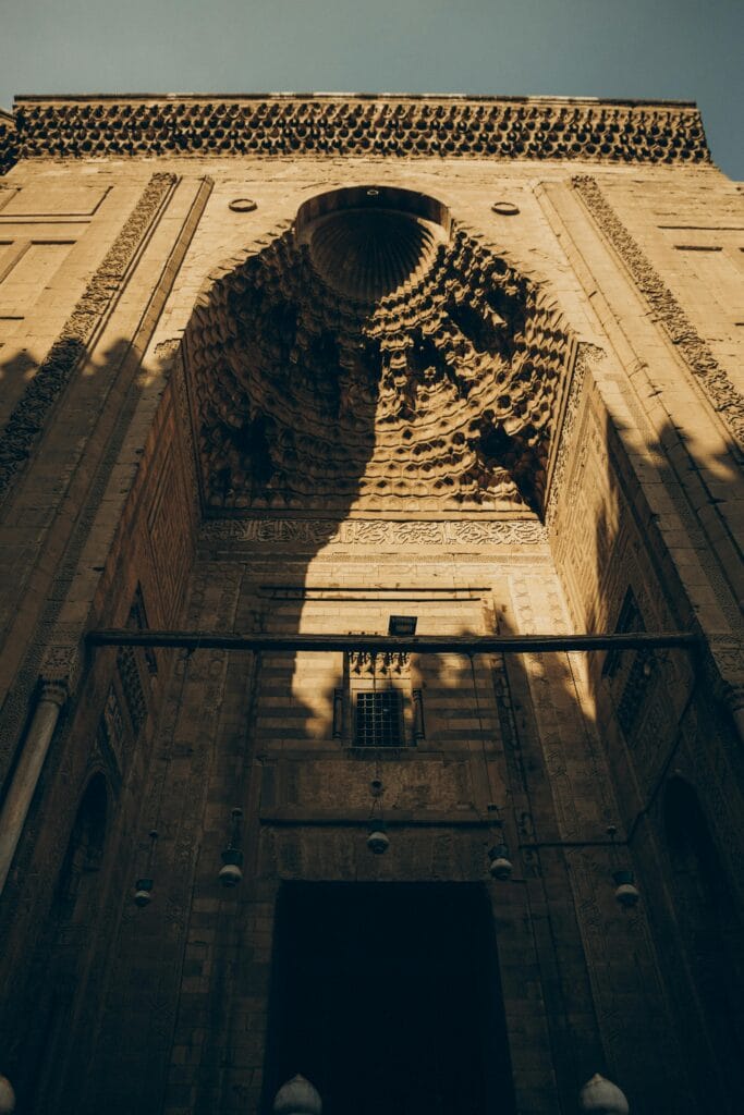 Detailed stone entrance of Sultan Hassan Mosque in Cairo