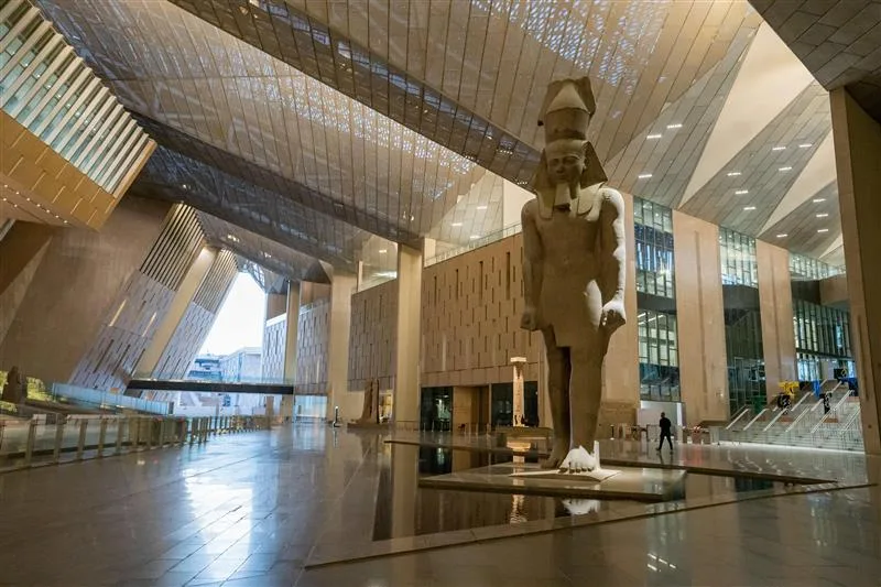 Grand Egyptian Museum GEM main atrium with colossal Ramses II statue and modern architecture Giza Cairo Egypt