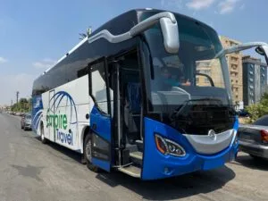 Empire Travel modern luxury tour bus with company branding for Egypt group tours and transportation Cairo