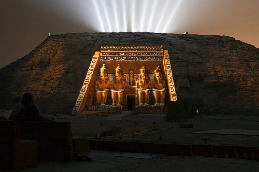 Abu Simbel Temple illuminated during the Sound and Light Show at night in southern Egypt