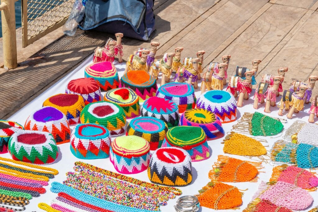 Colorful Nubian handicrafts and souvenirs displayed at Aswan Souq in Egypt